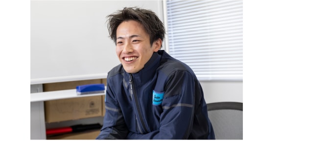 笑顔で話す北山 晃成さん